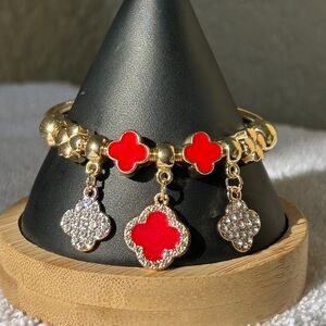 Stylish Gold and Red Clover Bracelet